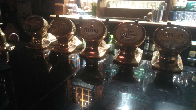 Photo of taps, illustrating some of the bar's range while also reminding what we had to drink.